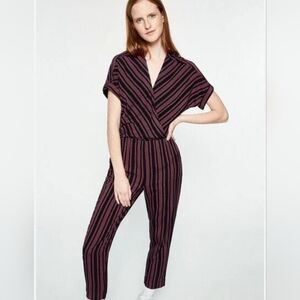 Black and Pink Wrap Jumpsuit with V-Neckline and Fitted Waist